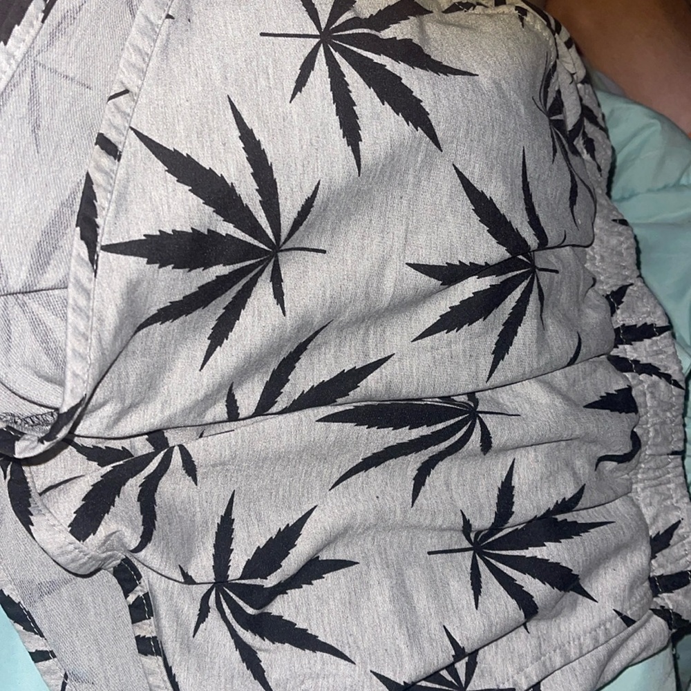 Weed shorts color grey and black size medium don’t know the brand